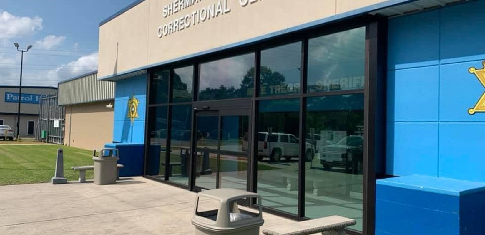 Commercial tempered glass entrance installed by LaPlace Glass Works