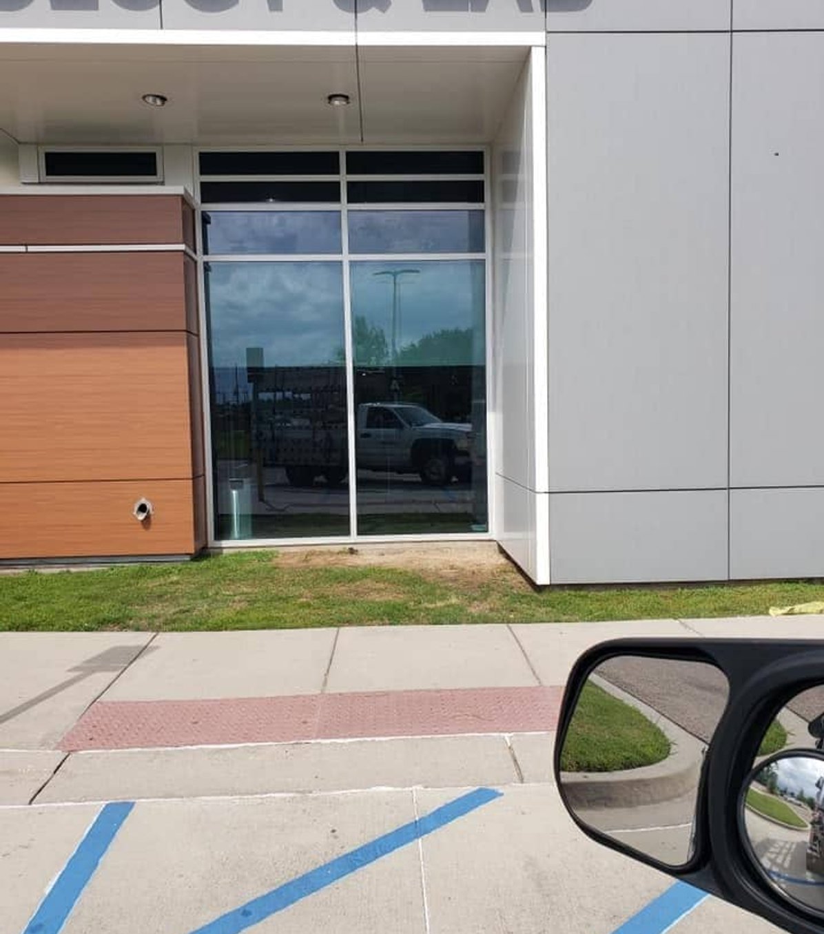 Commercial storefront entry door installed by LaPlace Glass Works